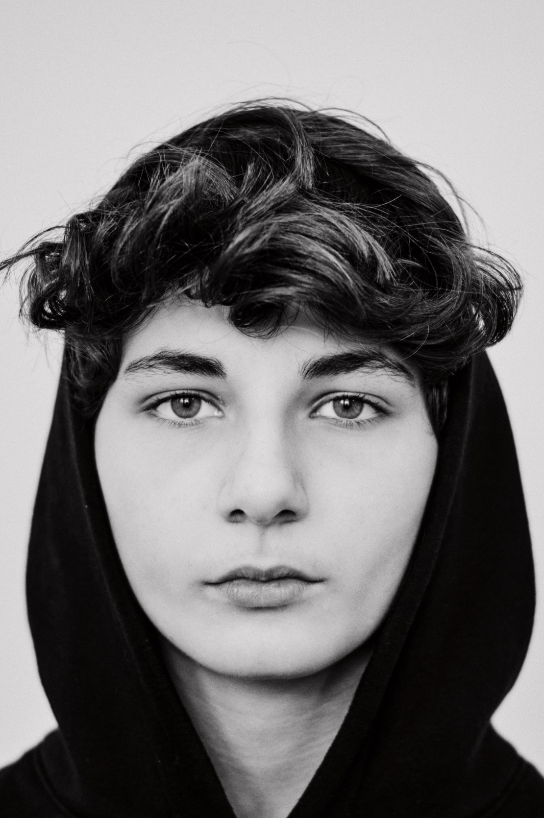 A long lens shot capturing emotional distance between characters.