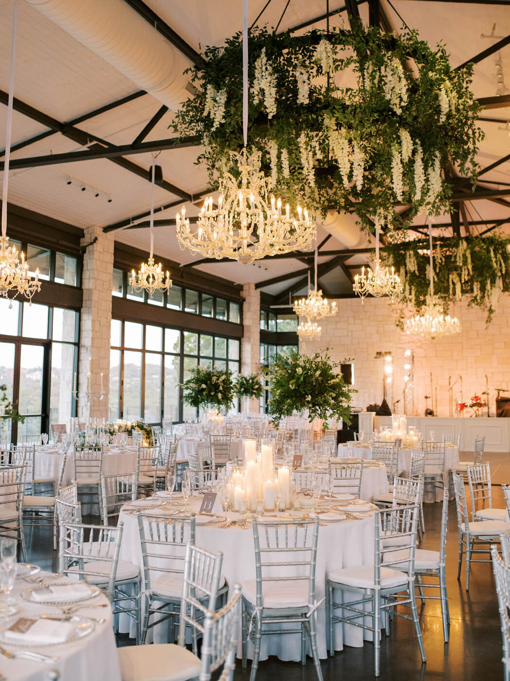 A white and green reception at the Pavilion at Omni Barton Creek