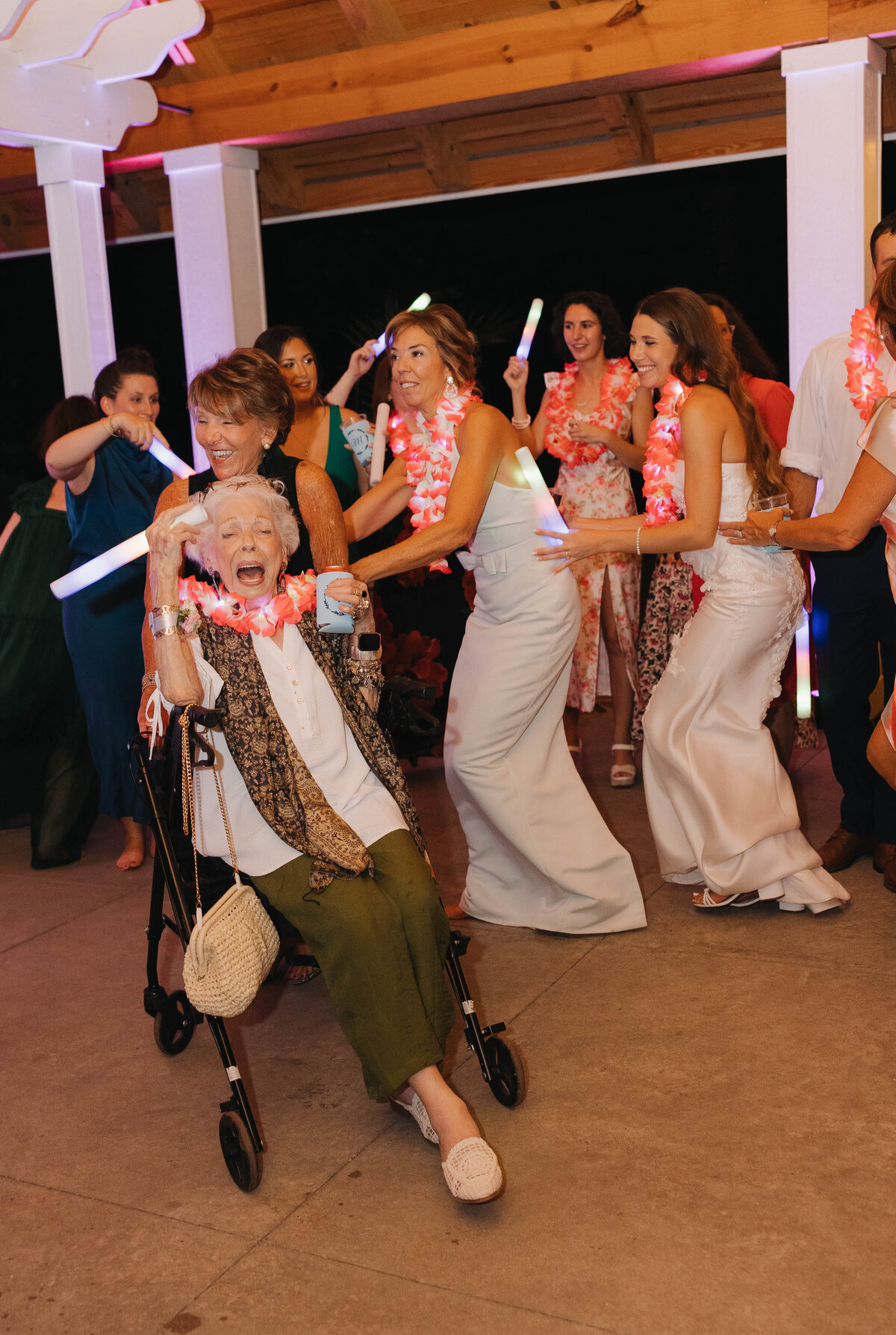 Grandma dancing on the dance floor at a summer wedding in Alabama