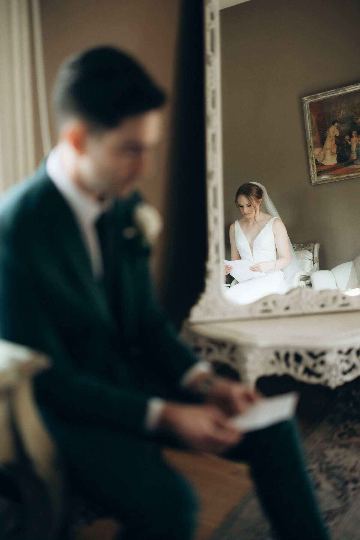 Bride and groom reading letters from each other capture by Victoria Pattemore, adventurous and authentic wedding photographer in Calgary, Alberta. Featured on the Bronte Bride Vendor Guide.