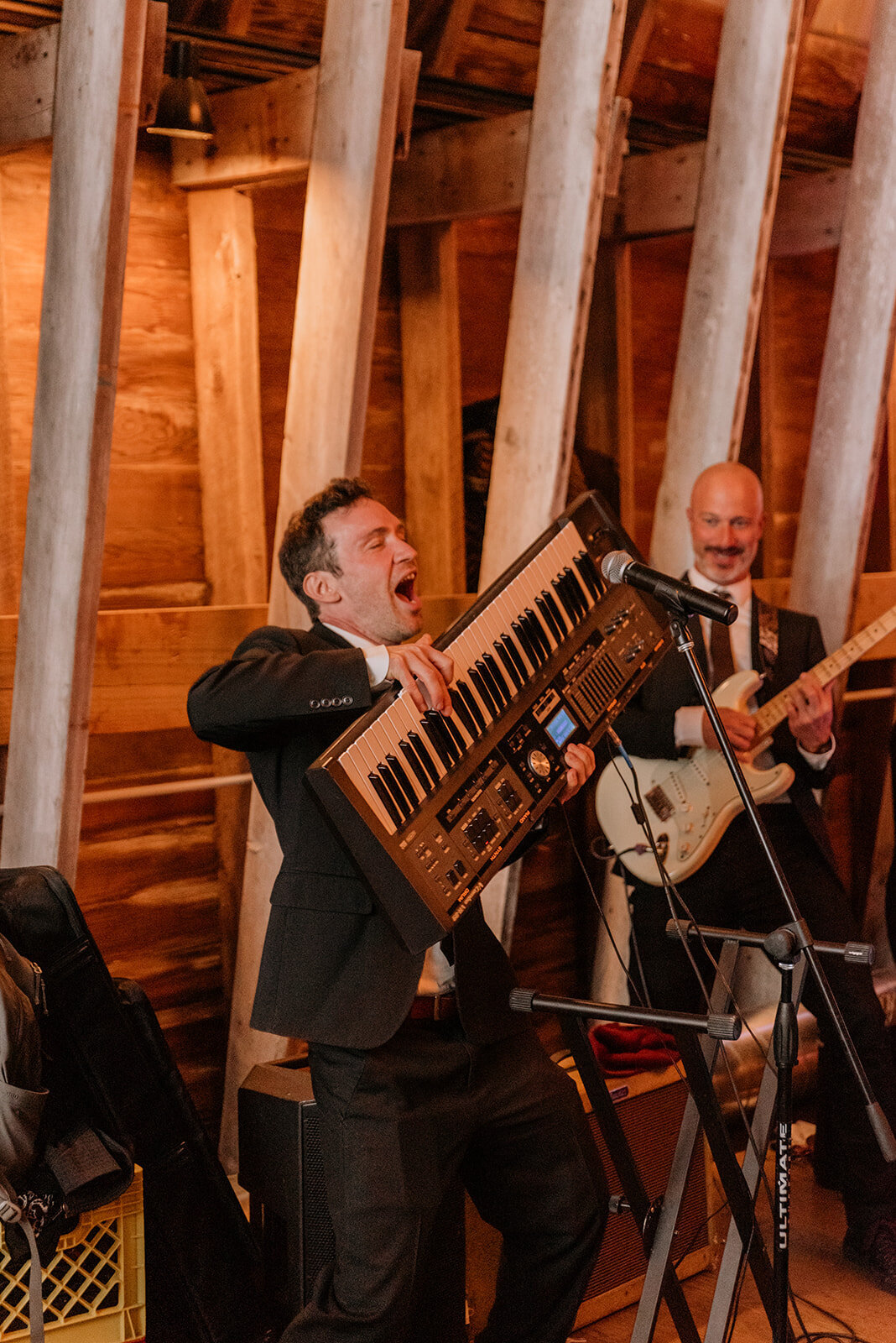 Unforgettable reception moment with live music and crowd interaction at Glenwood Mountain.

