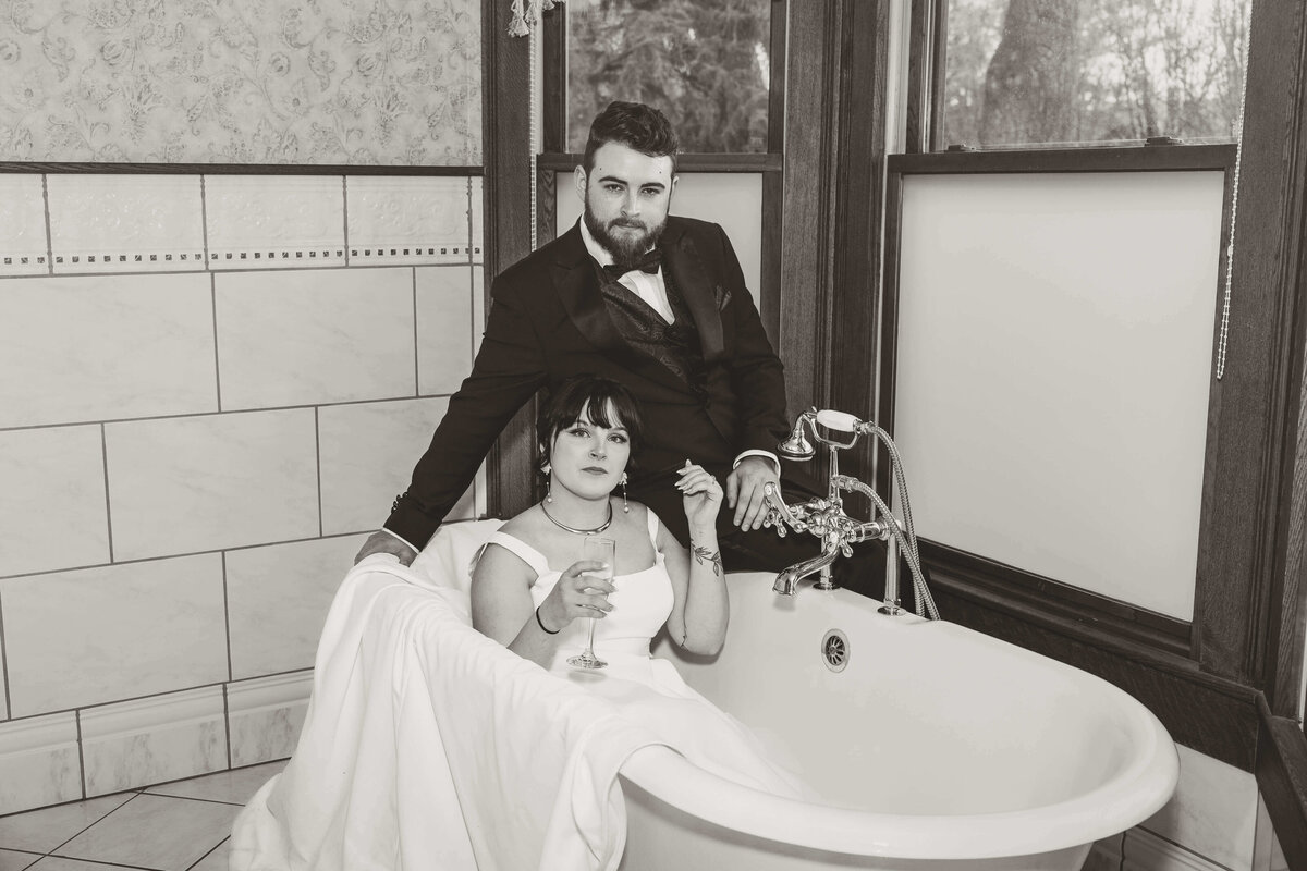 Bride and Groom Relaxing in Vintage Bathtub