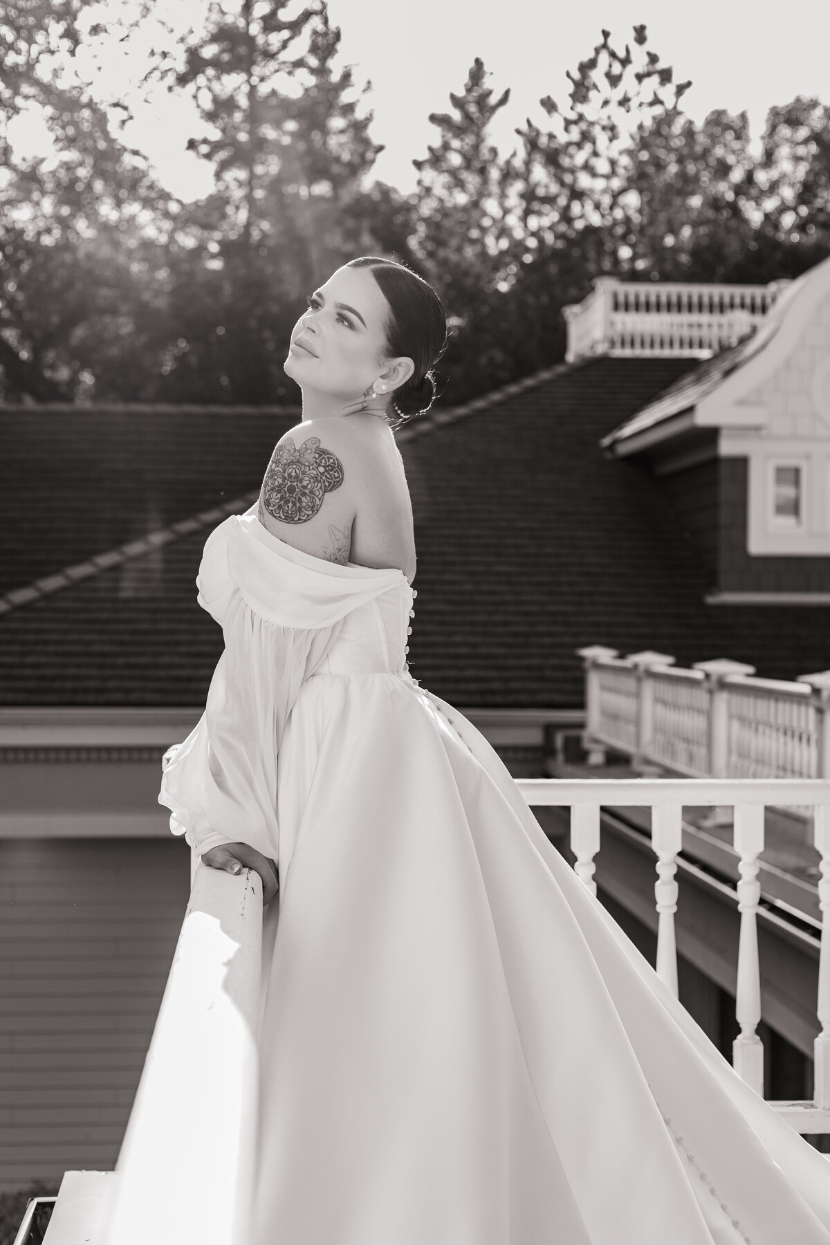 Bride soaks in the sun on a balcony at Norland Estate