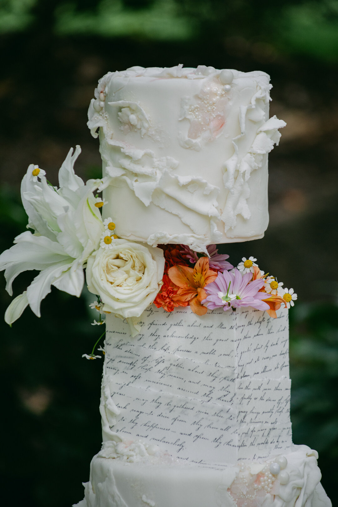 Elegant grandmillennial style wedding cake with pastel details, perfect for a Texas Hill Country, photographed by Marina Lazarine Photography.
