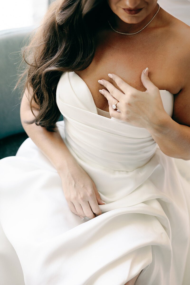 Bride dress details to show penthouse at riverside wharf photos