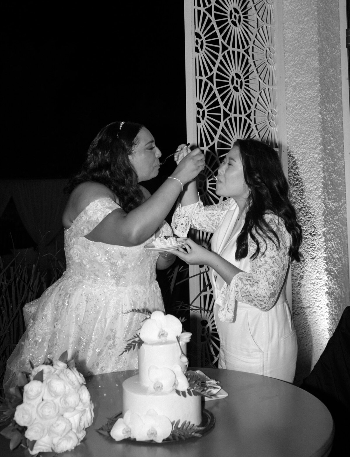brides share cake, same sex wedding cake cut, Playa del Carmen, Paradisus Mexico