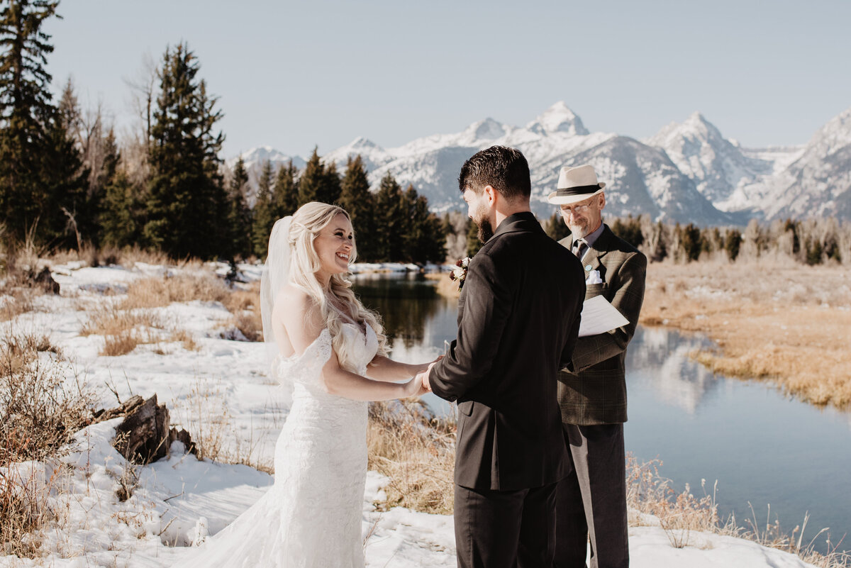 Jackson Hole Photographers capture bride looking at groom and smiling