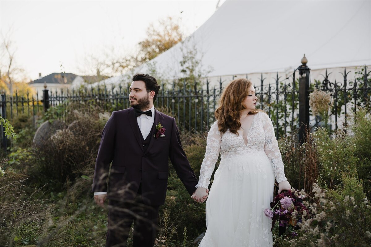 Wedding day portraits of a couple embracing at The White Chapel Projects in New Jersey