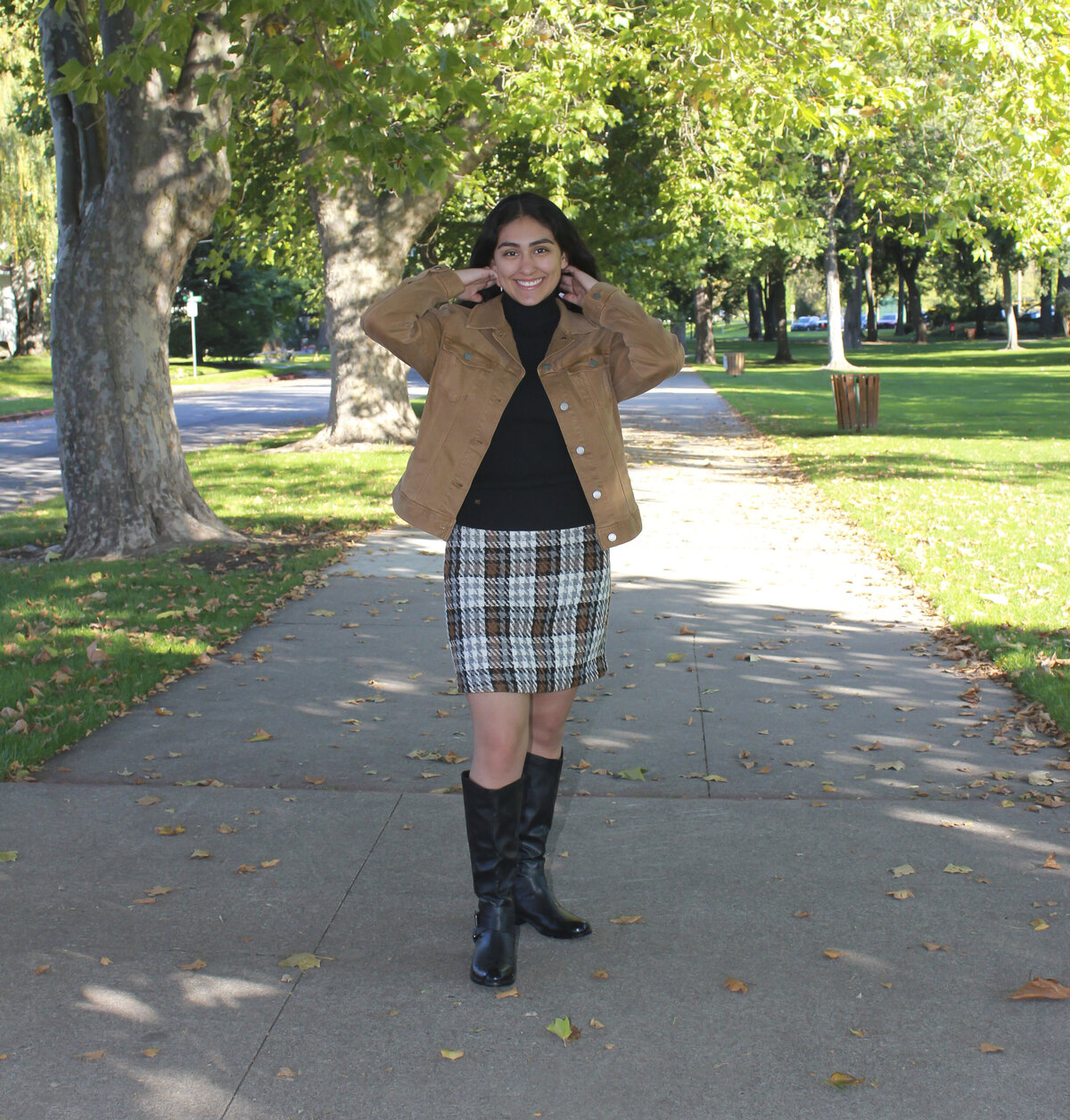 Young lady posing in park walk way