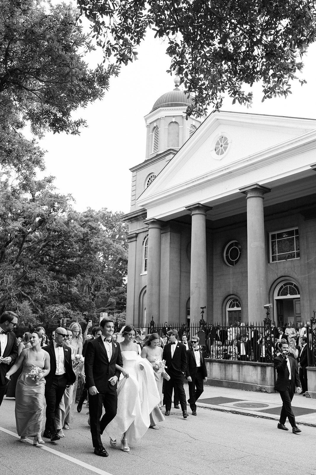 Classic Charleston Wedding processing down Meeting Street to Hibernian Hall by Sarah Bradshaw 0189