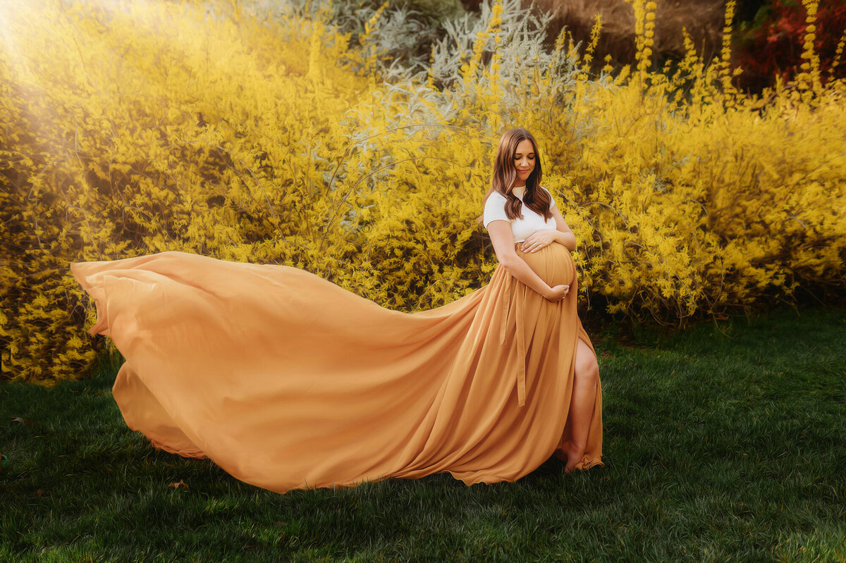 Expectant mother poses for Maternity Photoshoot in Charleston, SC.