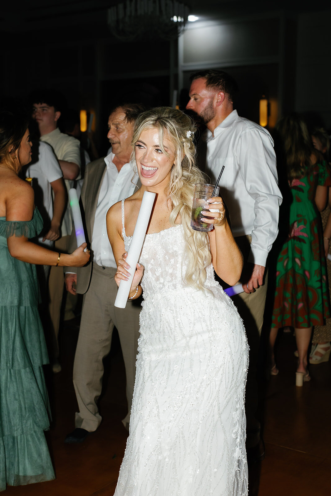 A joyful moment of Brenda dancing and celebrating on the dance floor.