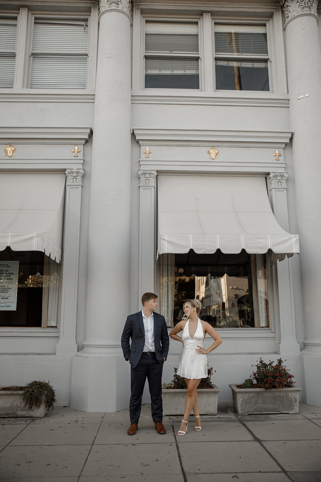 bride and groom pose for wedding portraits in san diego