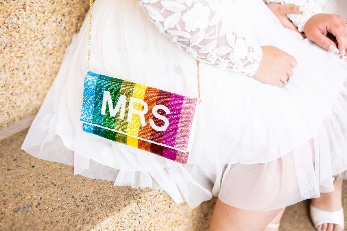 Rainbow mrs bag at LGTBQ wedding in Centennial Park, Nashville,TN
