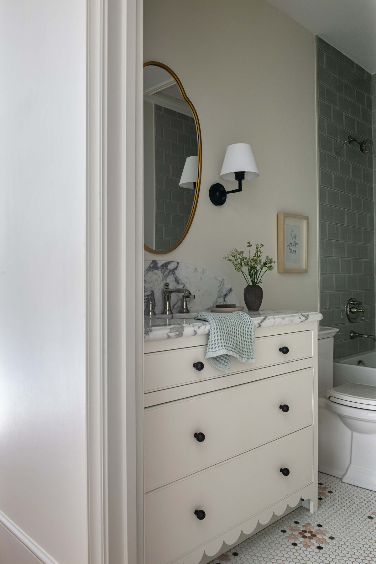 english-tudor-guest-bathroom-marble-vanity-and-green-tile