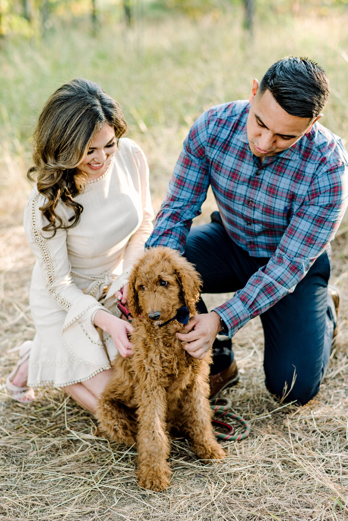engagement session photo with golden doodle