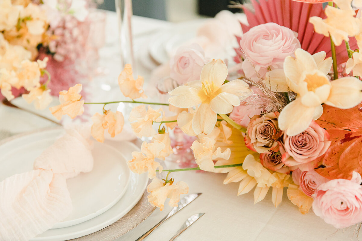 Floral arrangement reception table decoration boho wedding planner nyc
