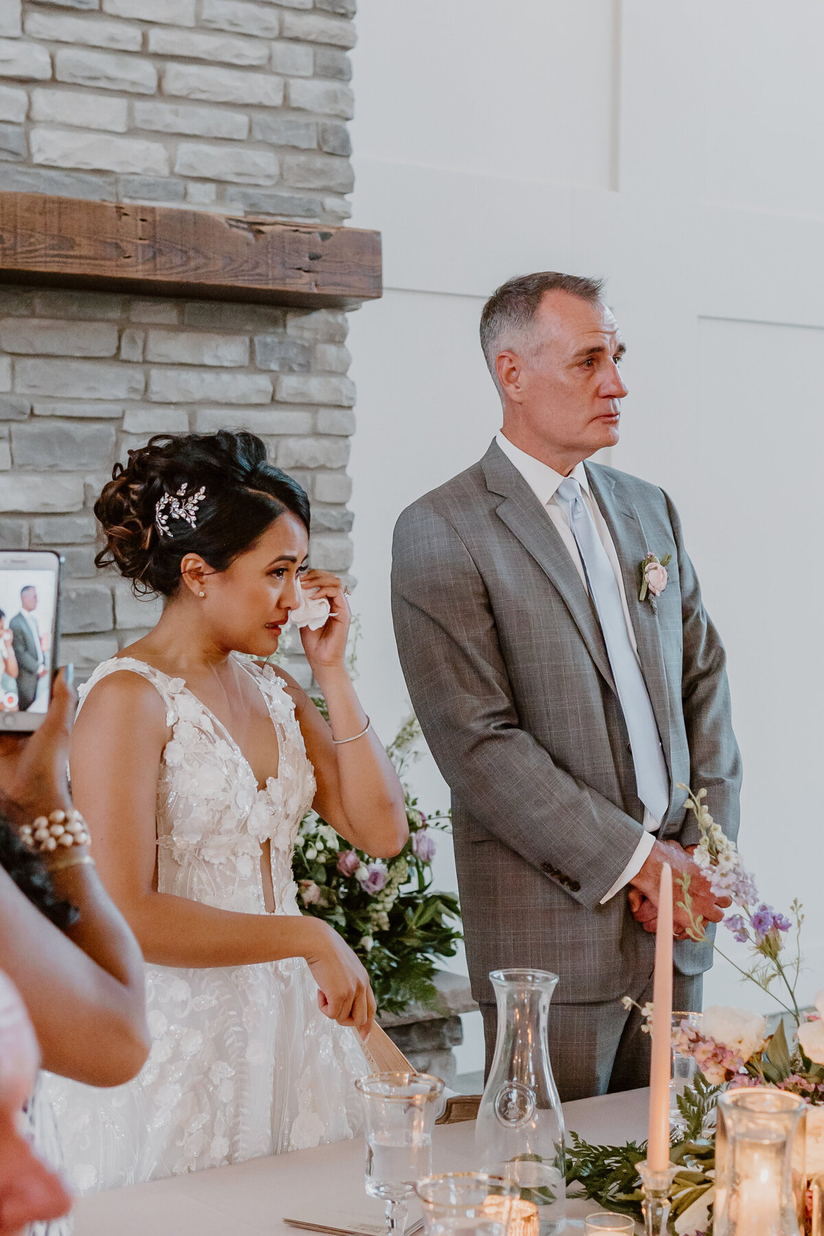 wedding-reception-toast-couple-crying-emerald-hills-events-promise-city-iowa-des-moines-wedding-photographer-storyteller-collective-photo-co