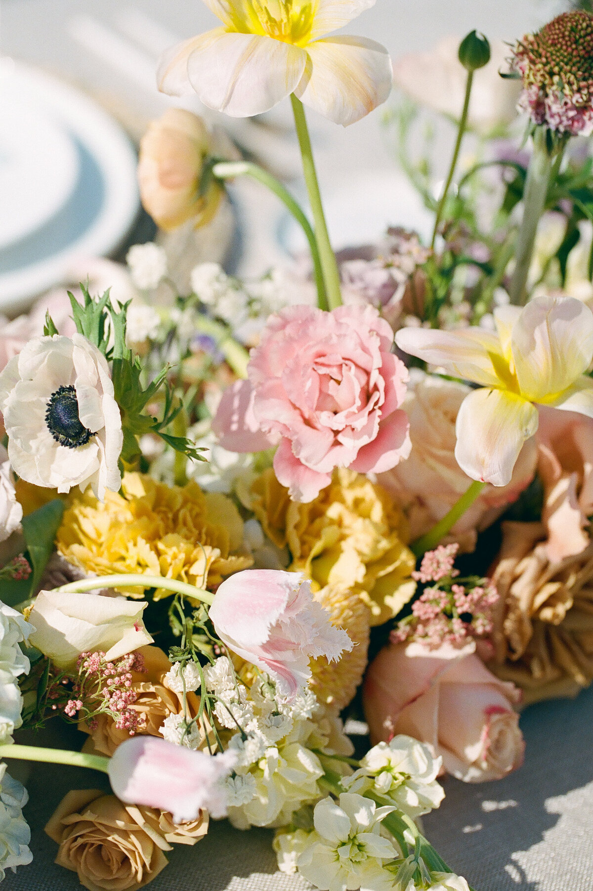 Pink, yellow, mauve, white and green bouquet.
