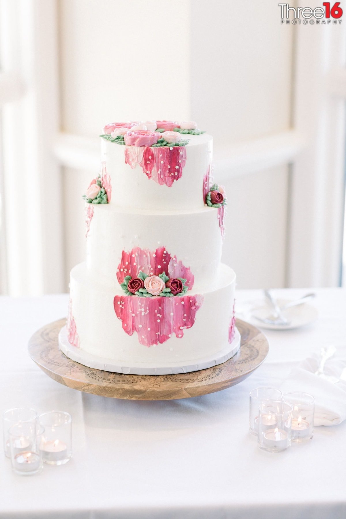 Pretty white 3-tiered wedding cake