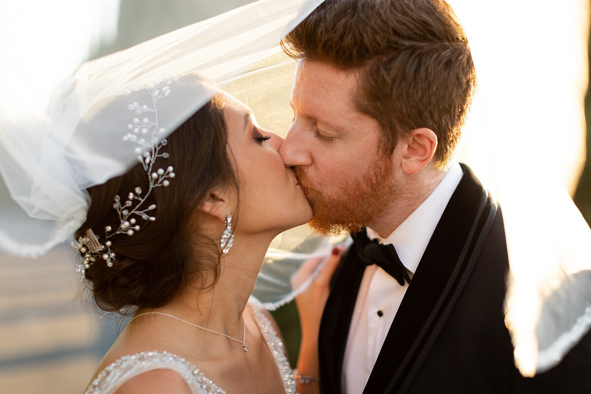 couples wedding portraits at sunset with mountain views in Palm Springs, CA