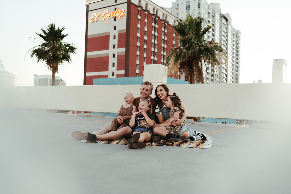Happy-family-is-on-the-roof-Rachel Murray-family-photography