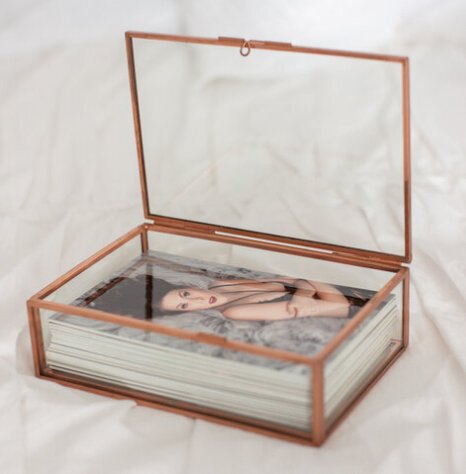 Glass box with prints that are offered at Andrea  Baue Photography in Minneapolis MN