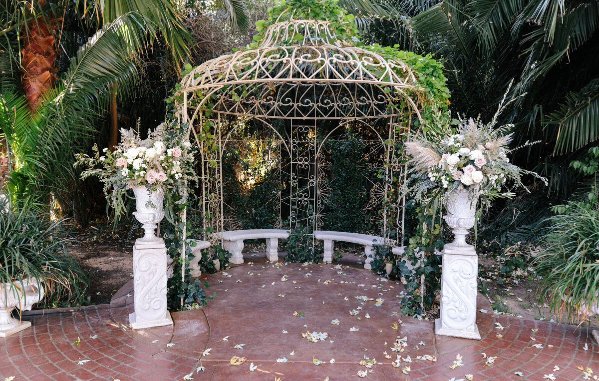 gazebo with large flower arrangements