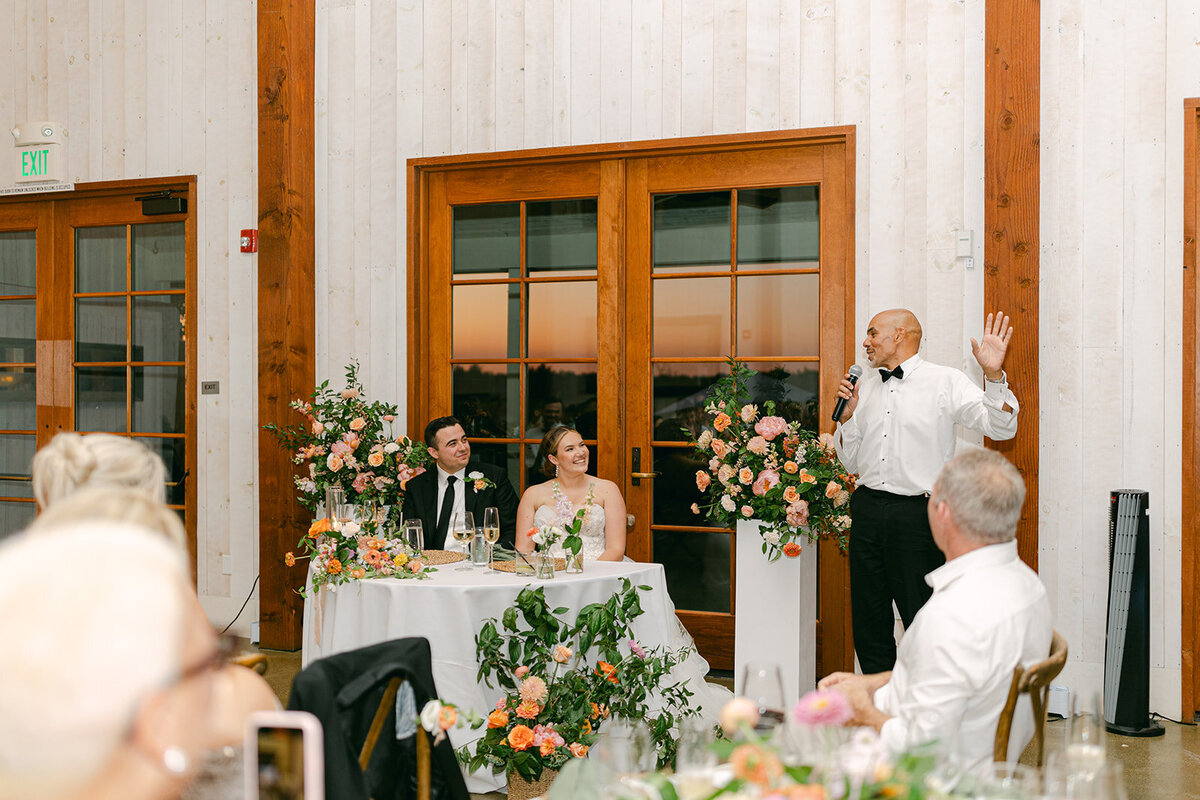 sweetheart table filled with flowers