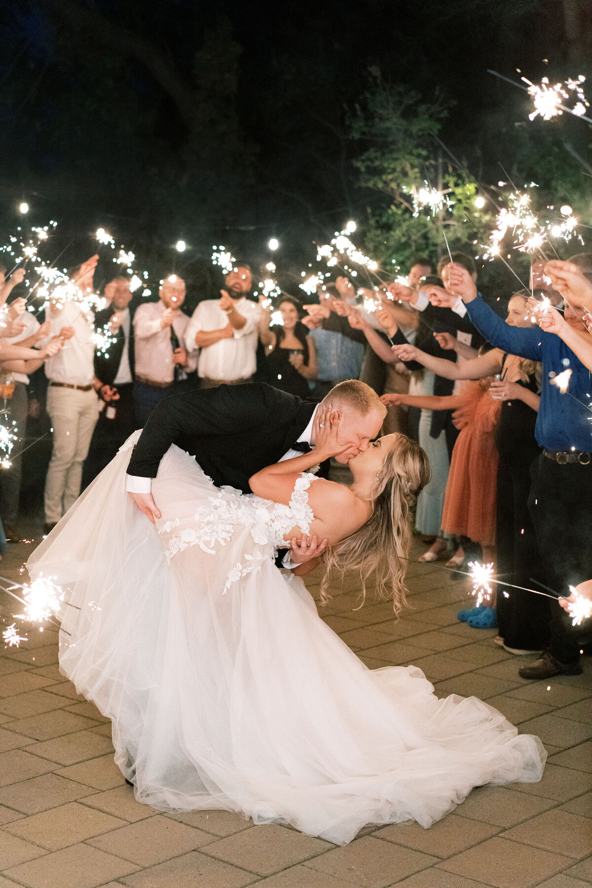 sparkler-wedding-exit-bride-groom-kiss-norland-historic-estate
