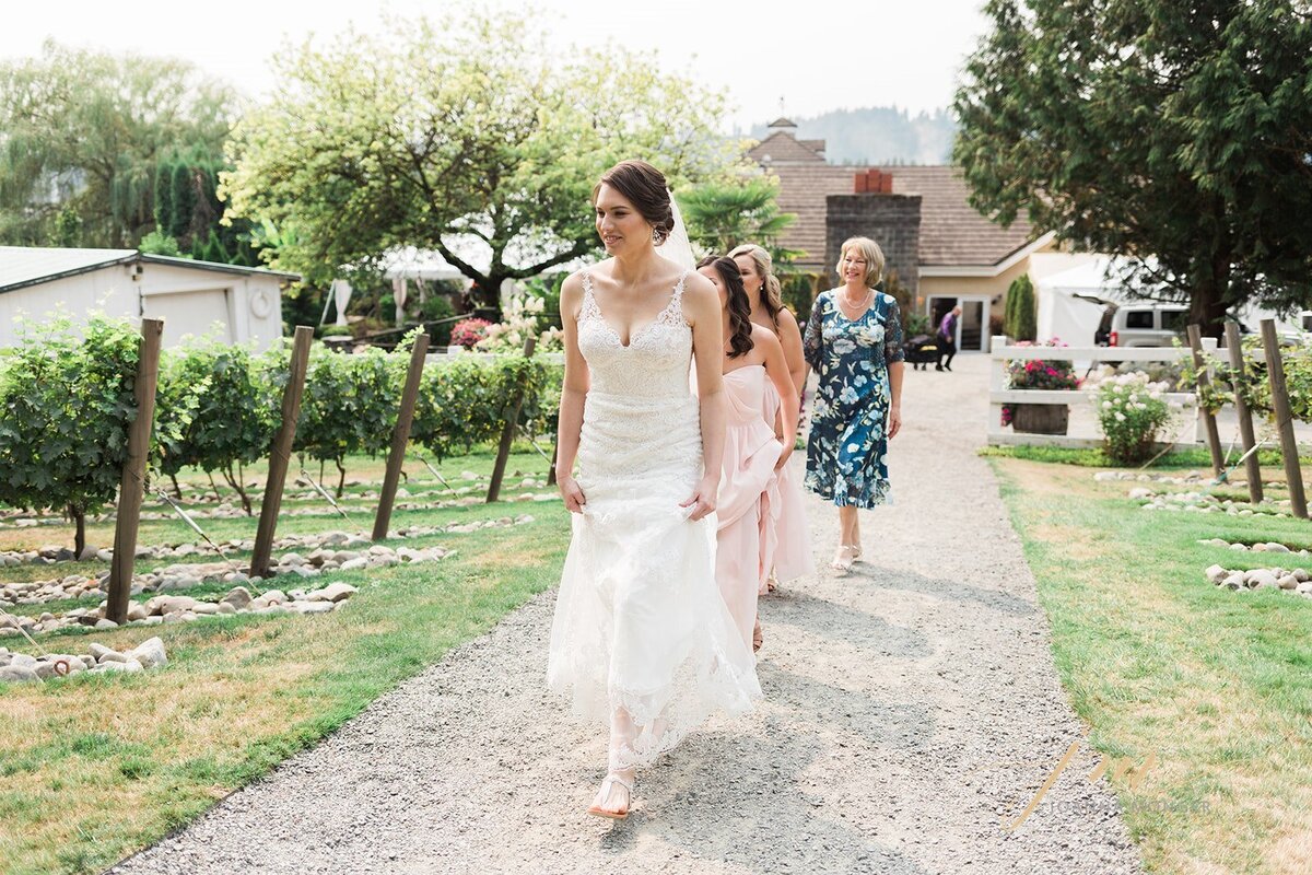 chateau lill woodinville wa. Weddings in woodinville, Bride walking though vineyard on her wedding day. Photos by Joanna Monger Photography