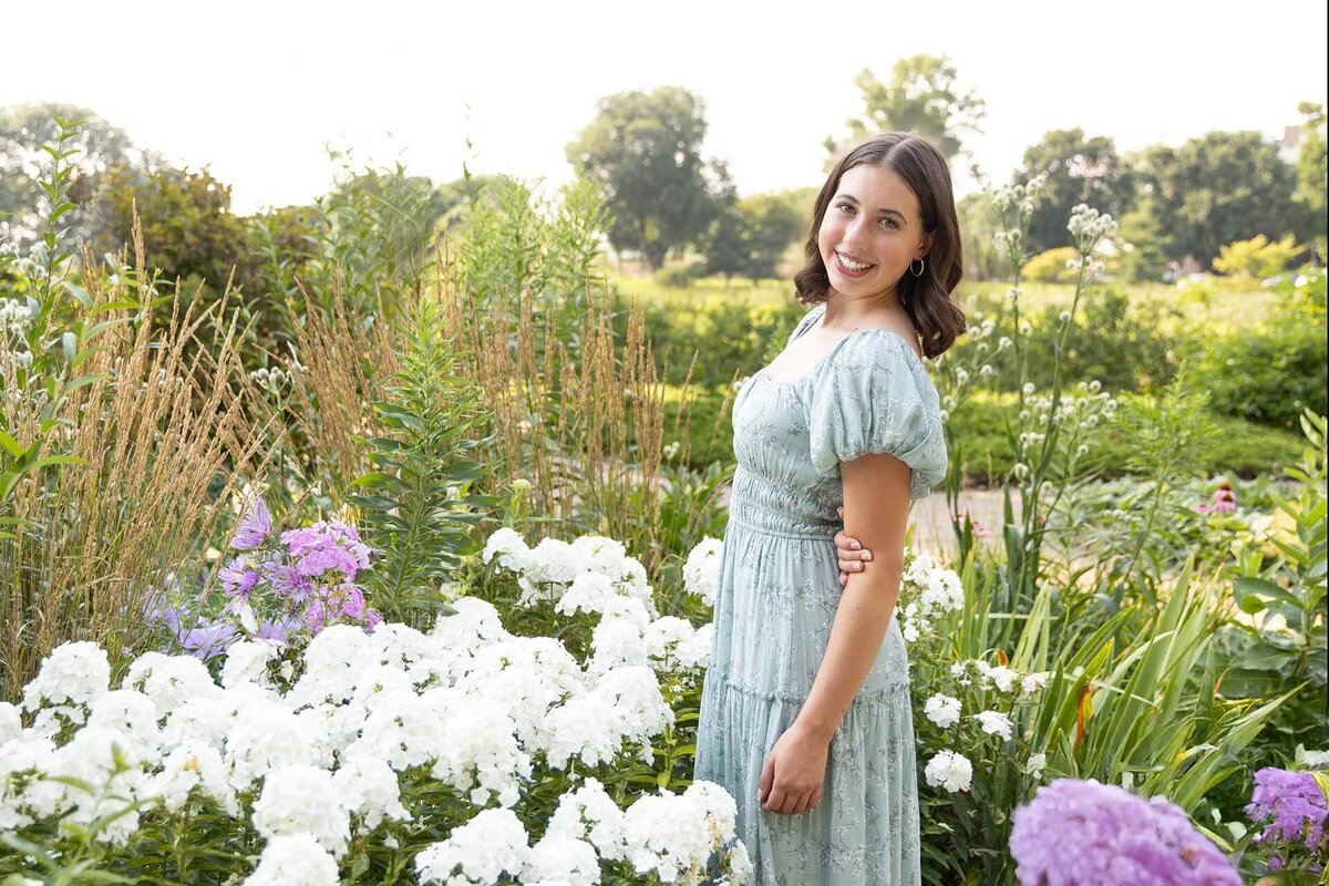happy-girl-by-flower-garden