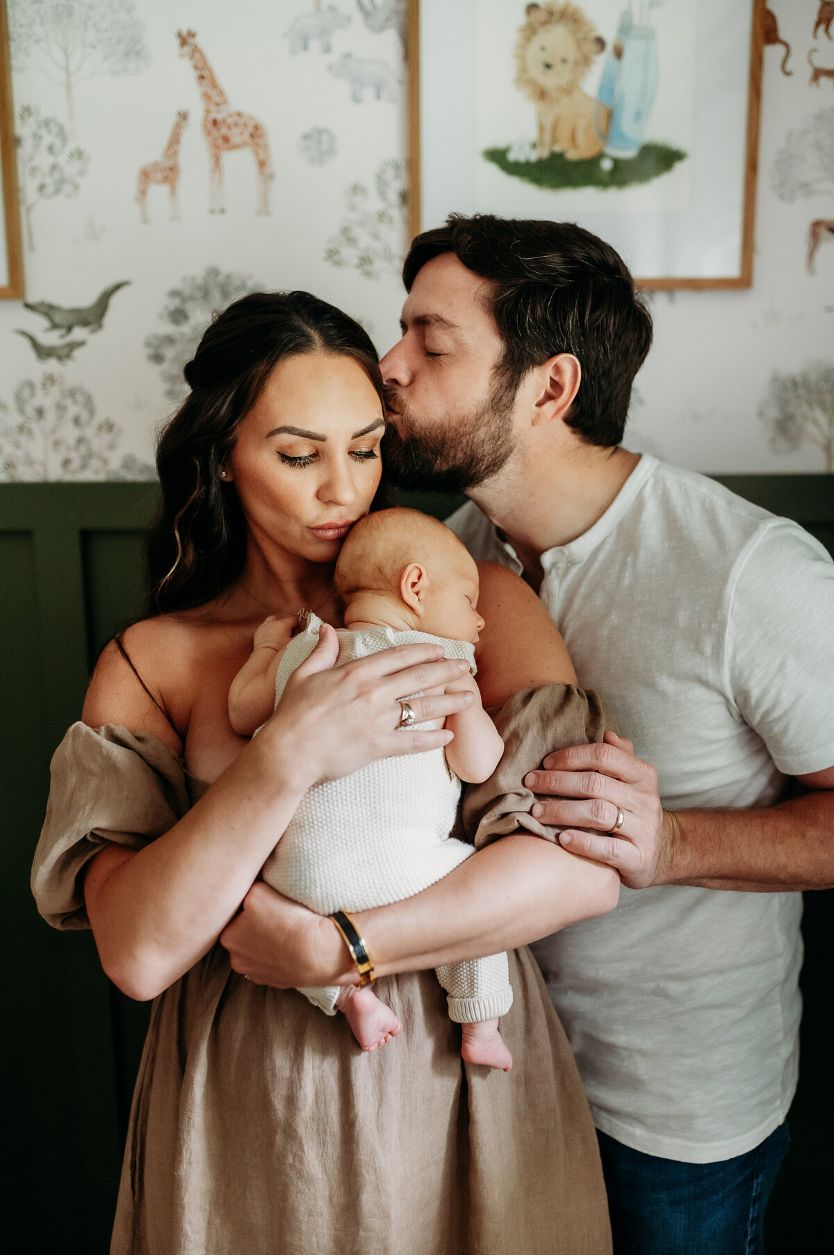 A mother gently cradles her newborn in a sunlit nursery, bathed in soft natural light, creating an intimate and timeless moment.