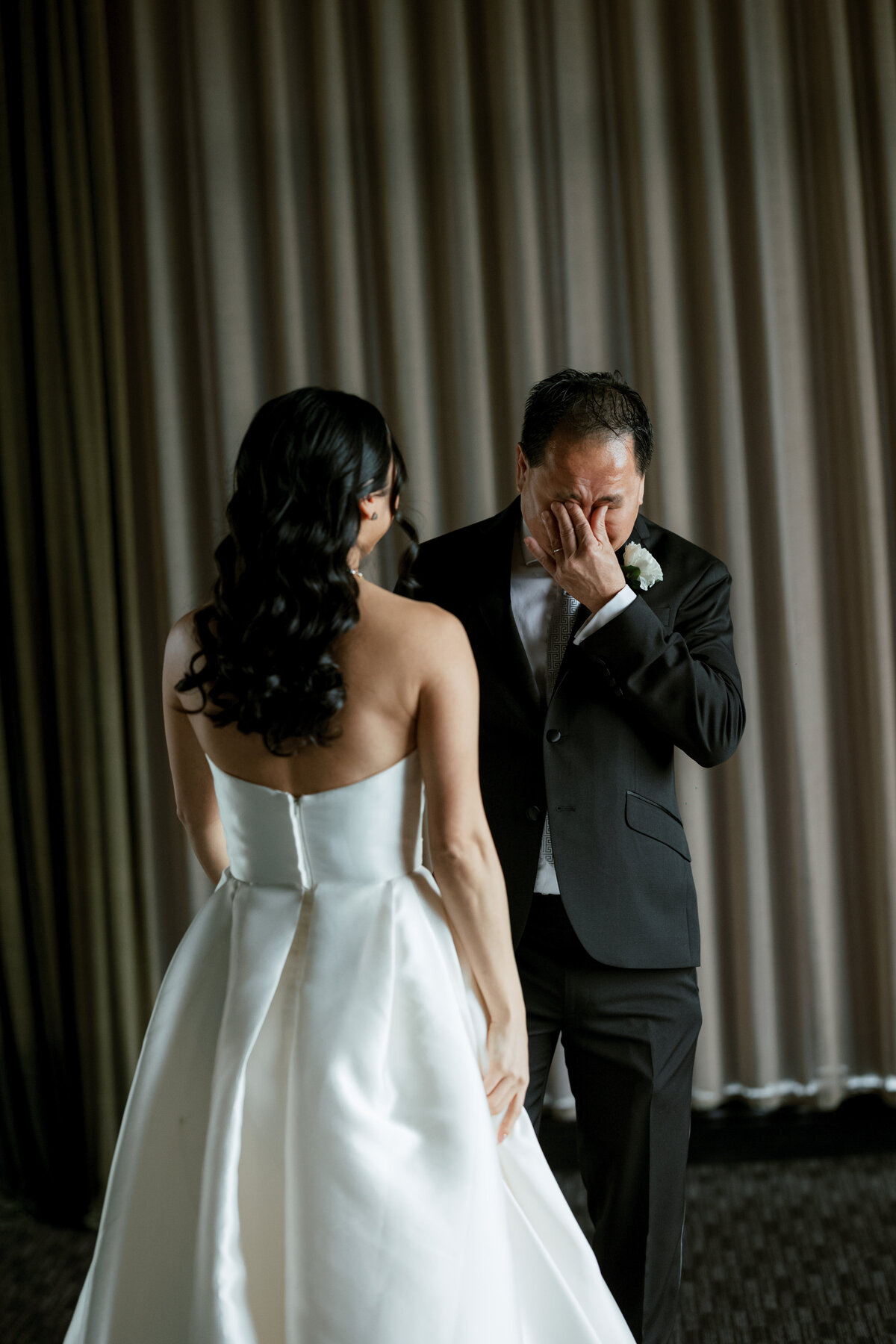 A photo of the couple during their first look at the Hotel Zaza