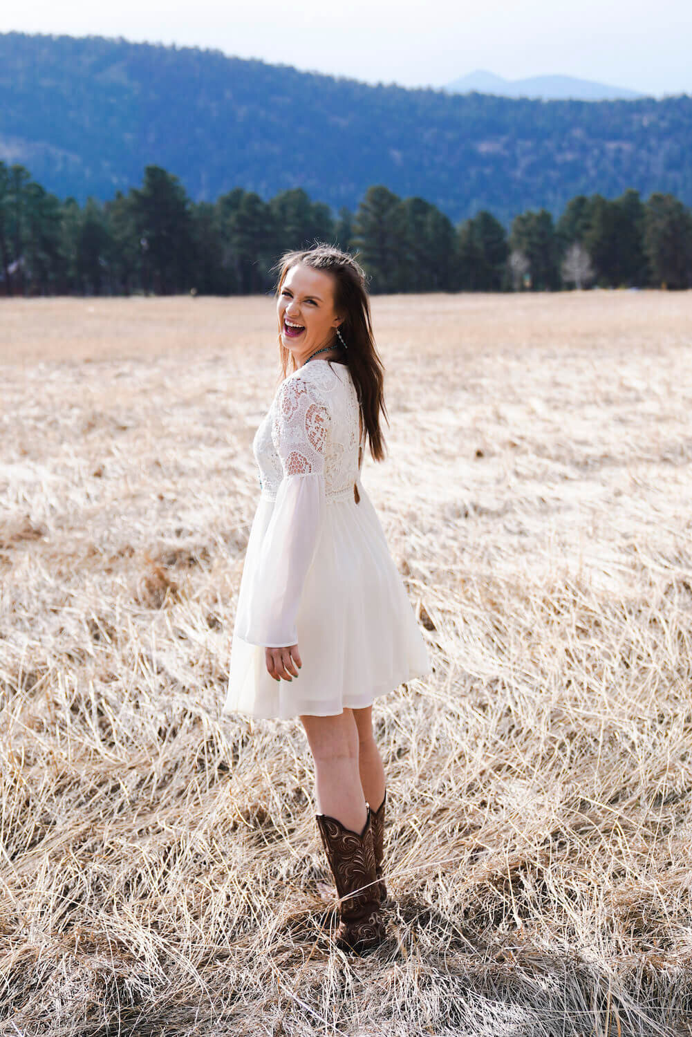 denver photography senior pictures - girl in white standing in field