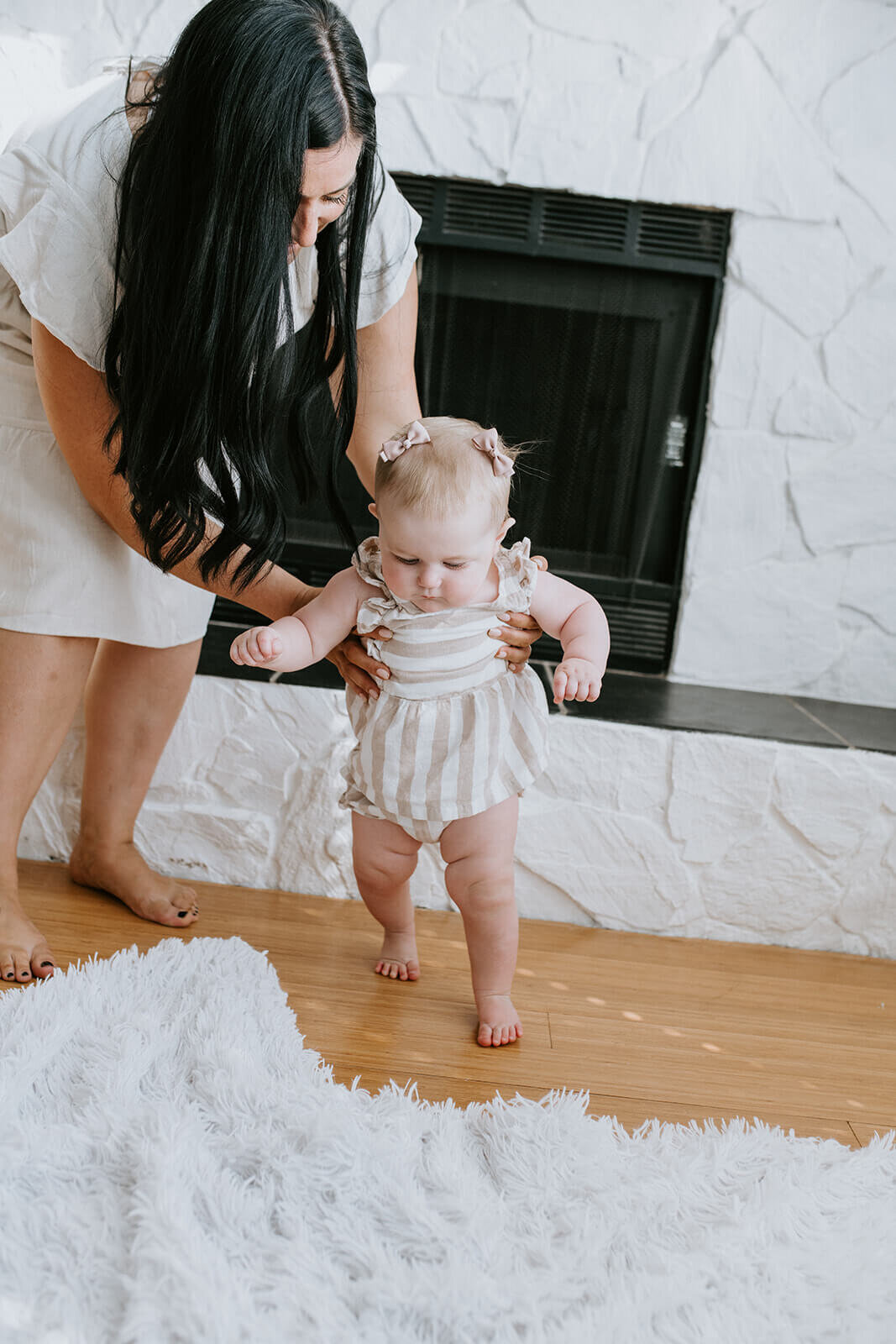 Mother-helping-baby-walk