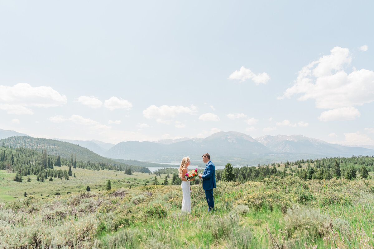 Lake Dillion Reservoir Colorado Elopement Wedding Mountain View Summer Pink and Orange Florals Sparkly Dress Light and Airy Elena Spraguer Photography0025