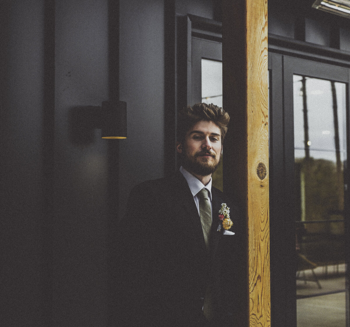 Groom solo portrait at Pinewood, Cambridge, MN - Foresty bride and groom candid photo at Pinewood, MN - https://methodandmatte.com/