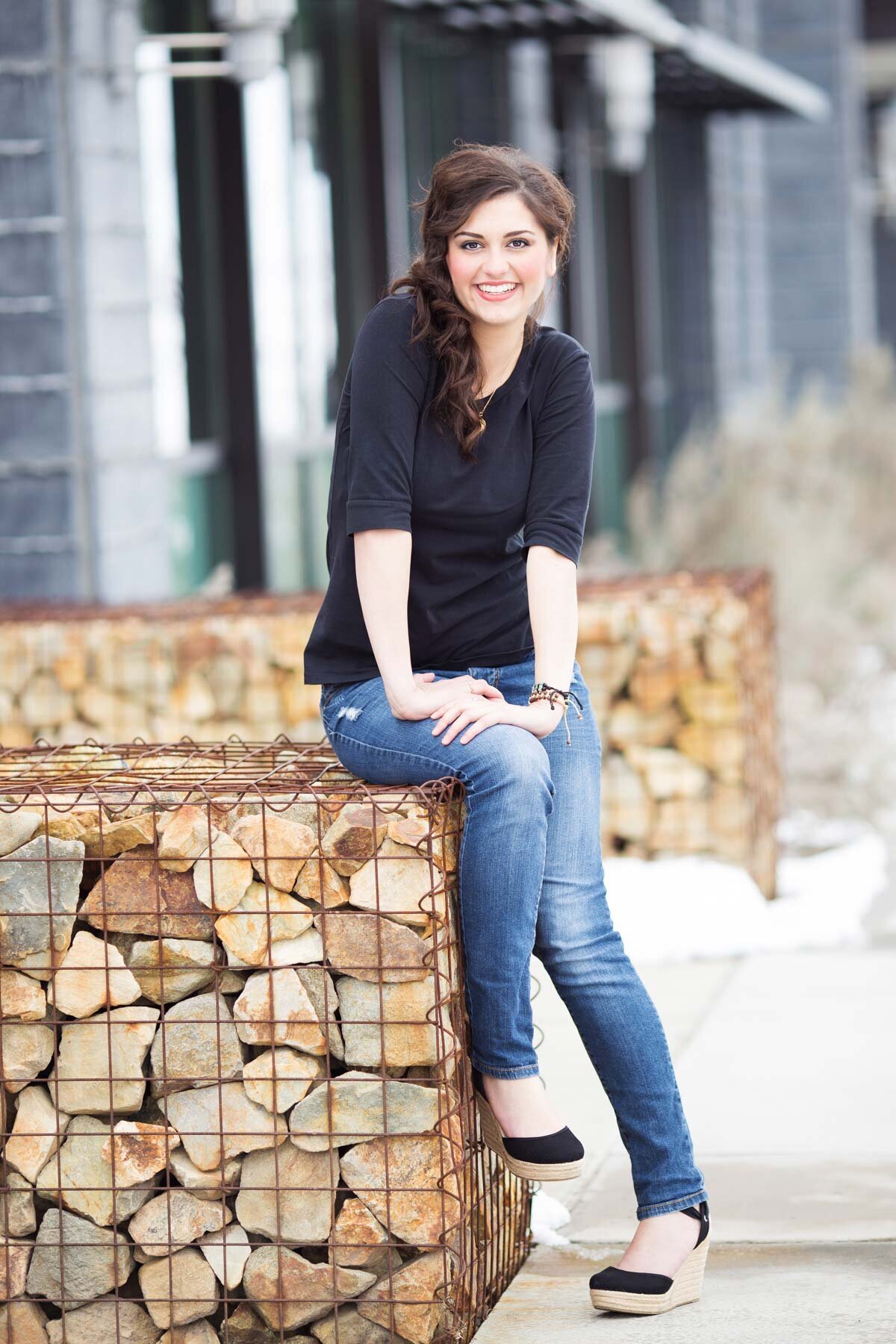 Senior girl posing against rock wall in Daybreak, Utah in Salt Lake City.