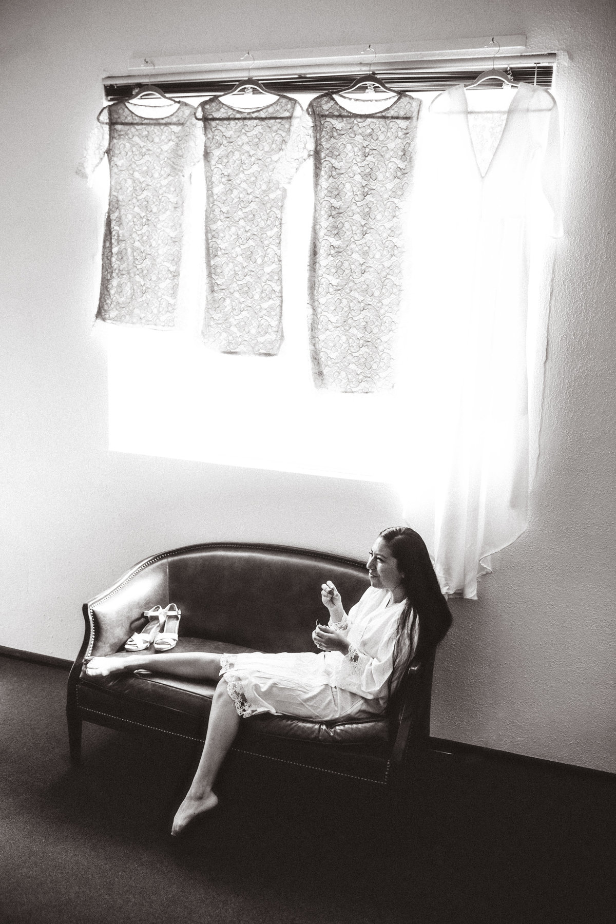 Wedding Photograph Of Woman Sitting in  Couch With Sandals Los Angeles