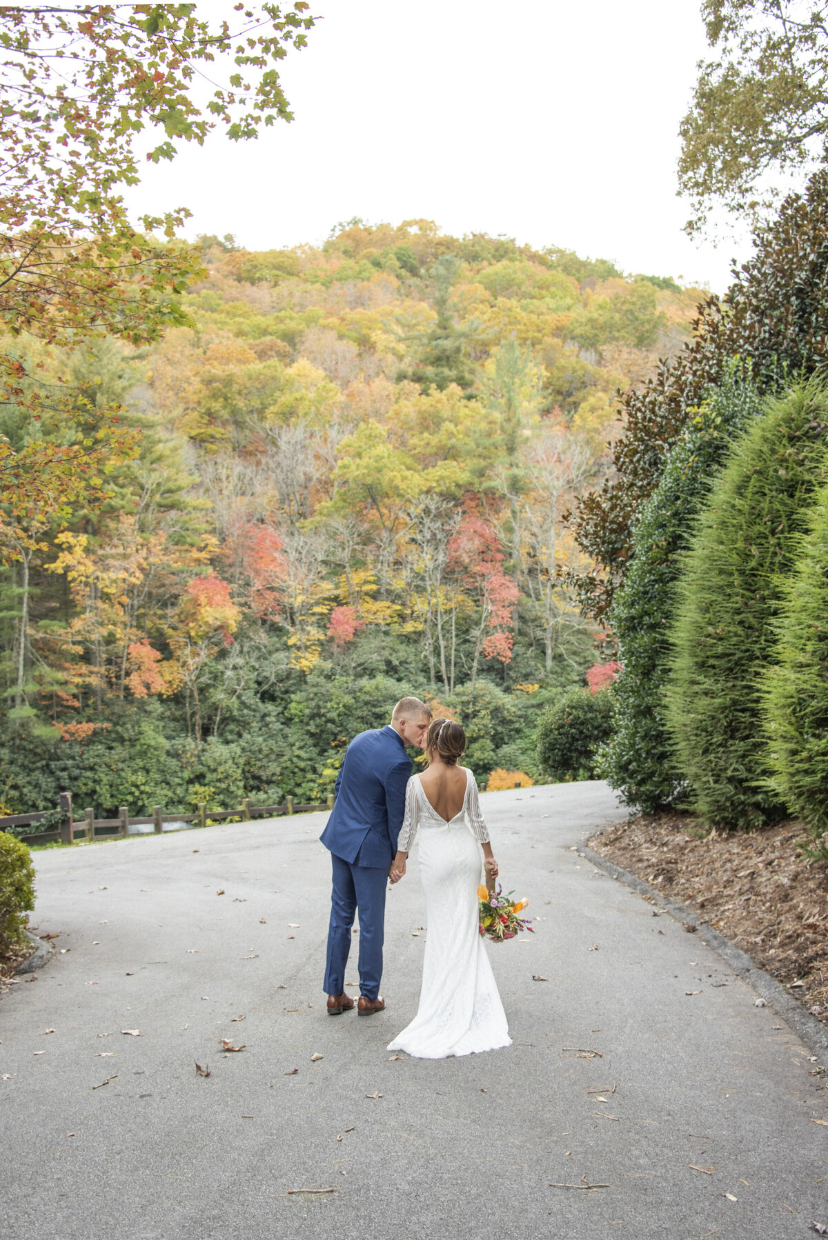 Couple kissing fall wedding photography Hendersonville NC