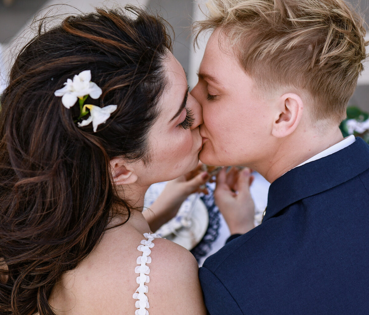 brides kissing to celebrate their elopement by Destin Florida elopement photographer Amanda Richardson Photography