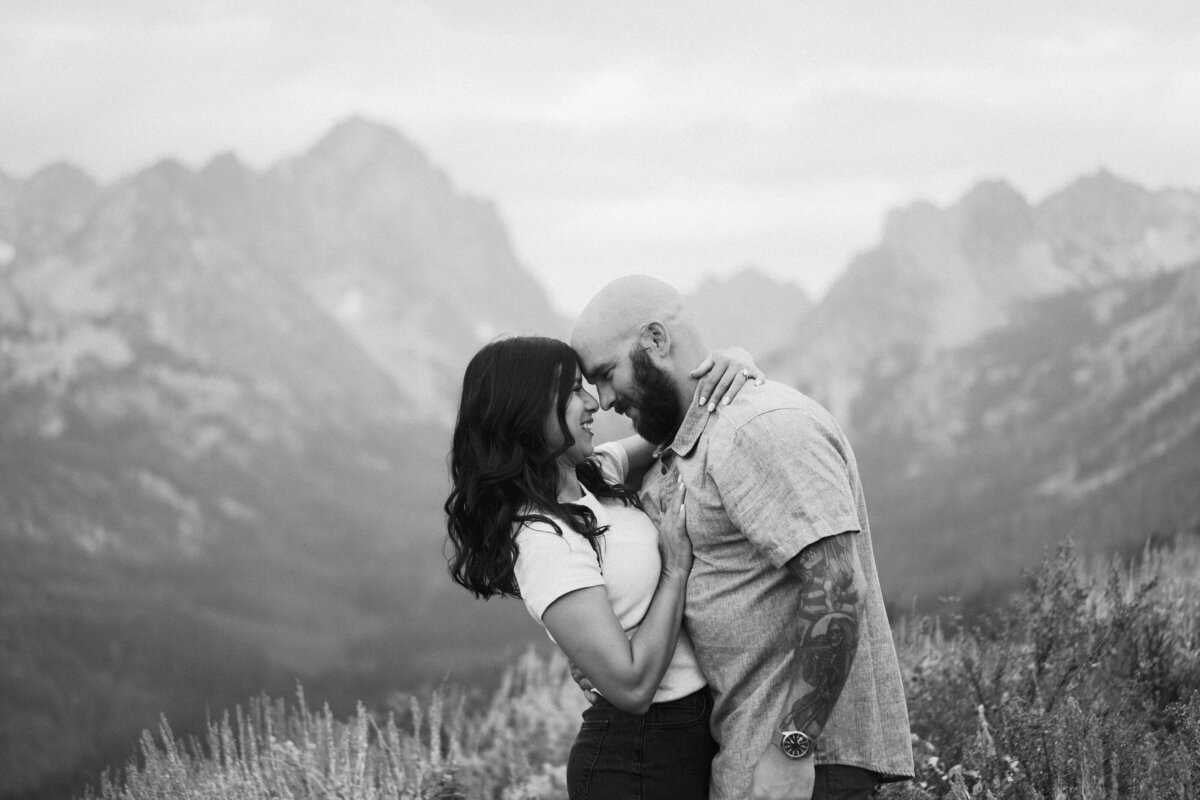 Couple during golden hour engagement shoot in Stanley, Idaho wedding/elopement - photographed by The Storytellers
