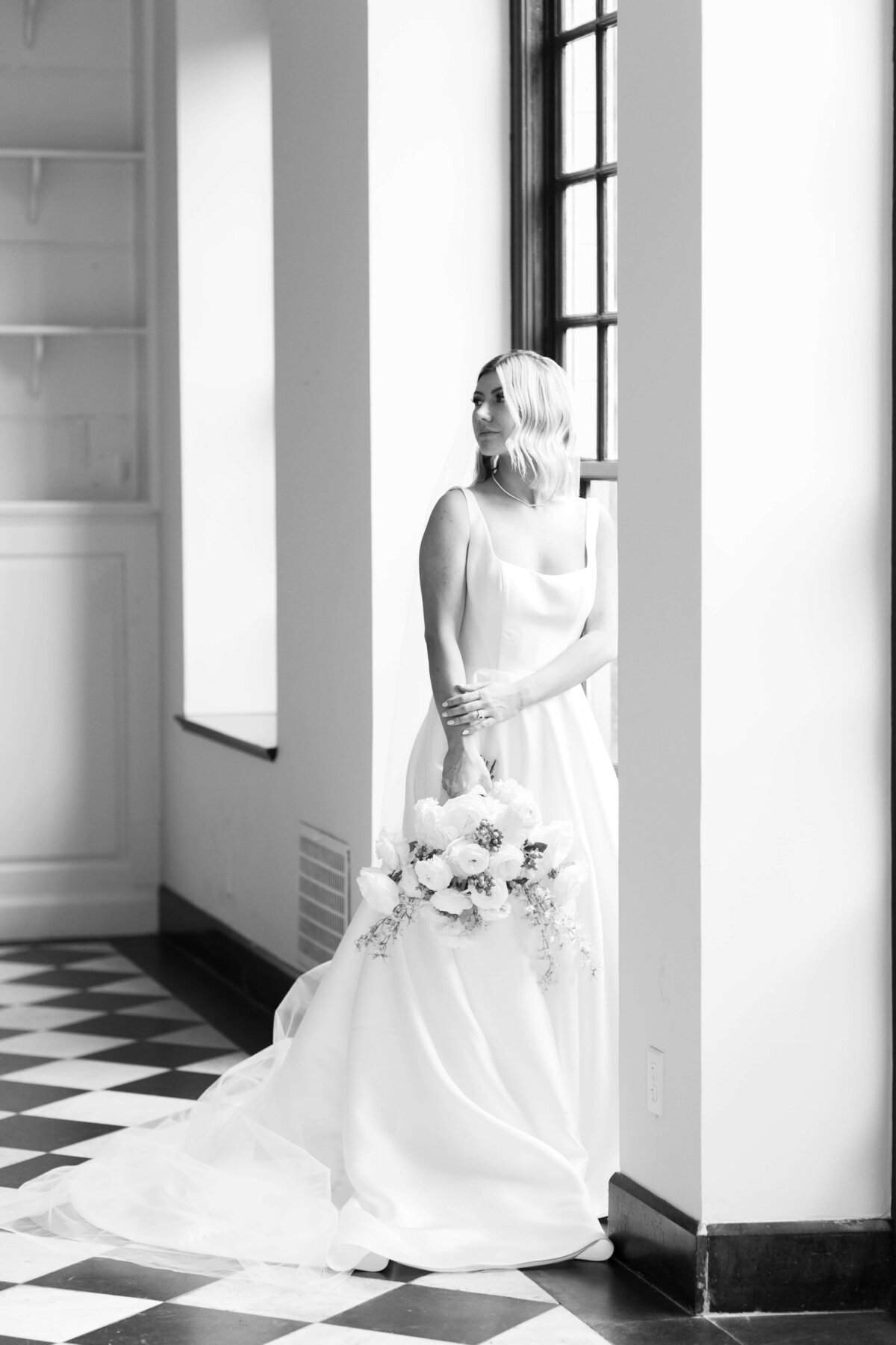 black and white image of bride at conestoga house and gardens wedding