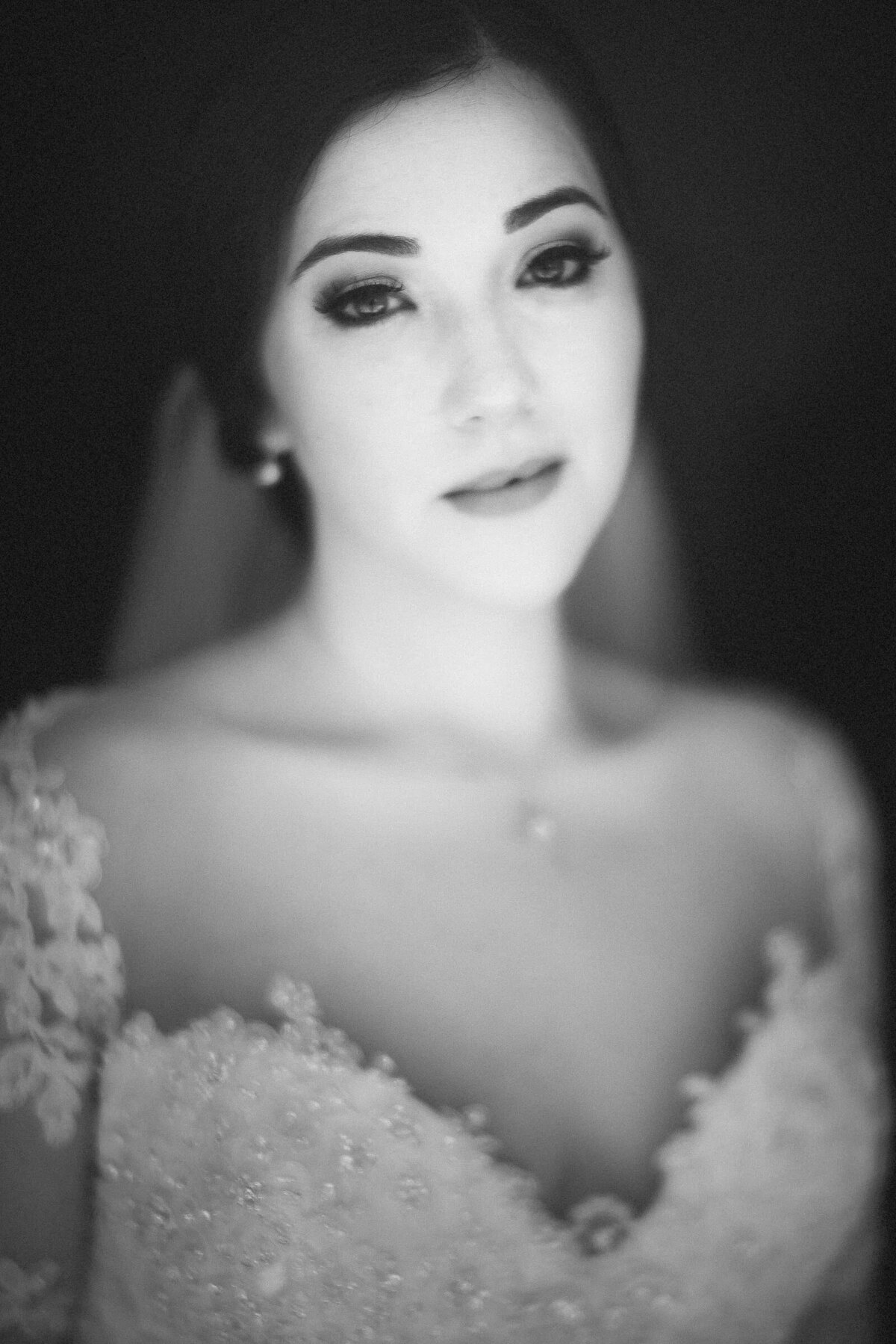 A soft image of a bride in a wedding dress