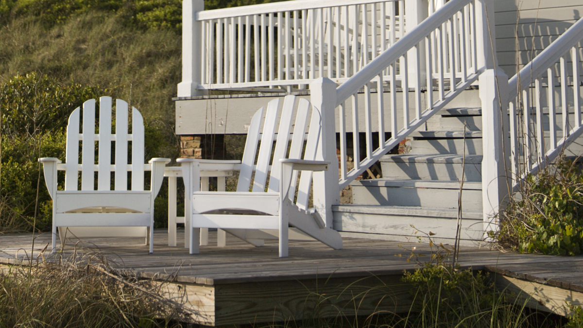 chairs on a dock by the lake