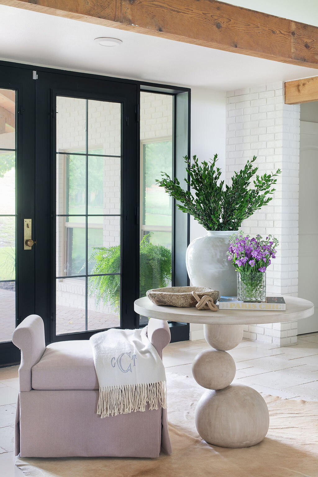 black french doors with decorated end table