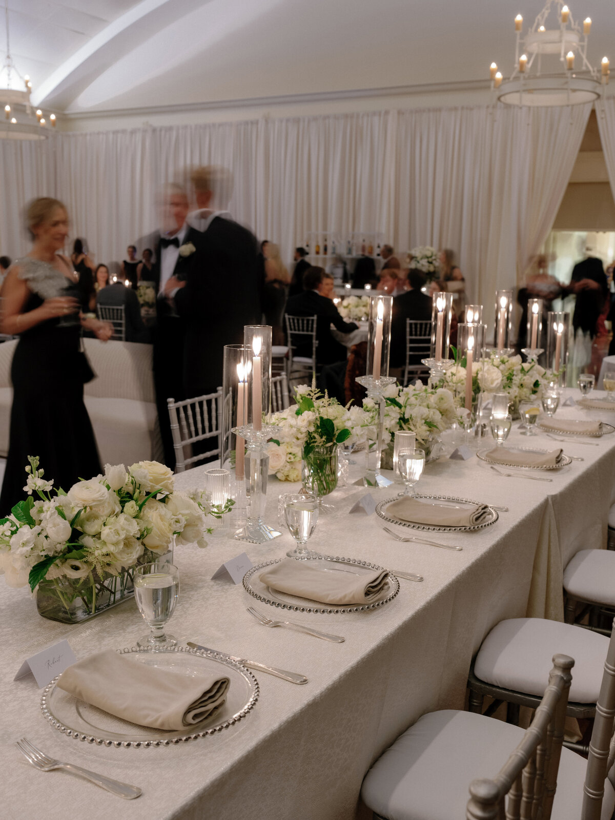 Elegant reception decor at The Swan House in Atlanta, featuring floral centerpieces and ambient lighting.