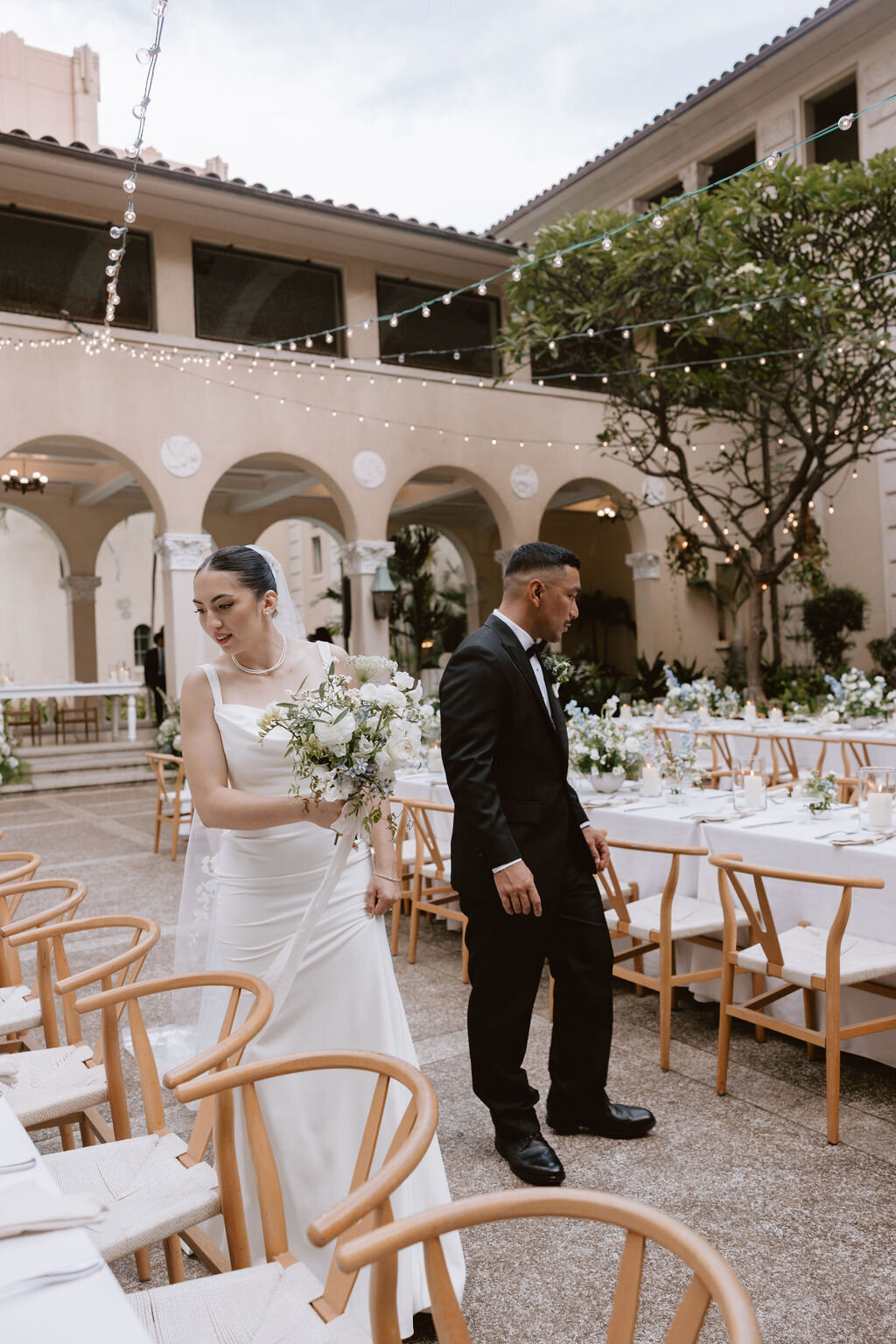 Bride and groom seeing reception for the first time at cafe julia hawaii