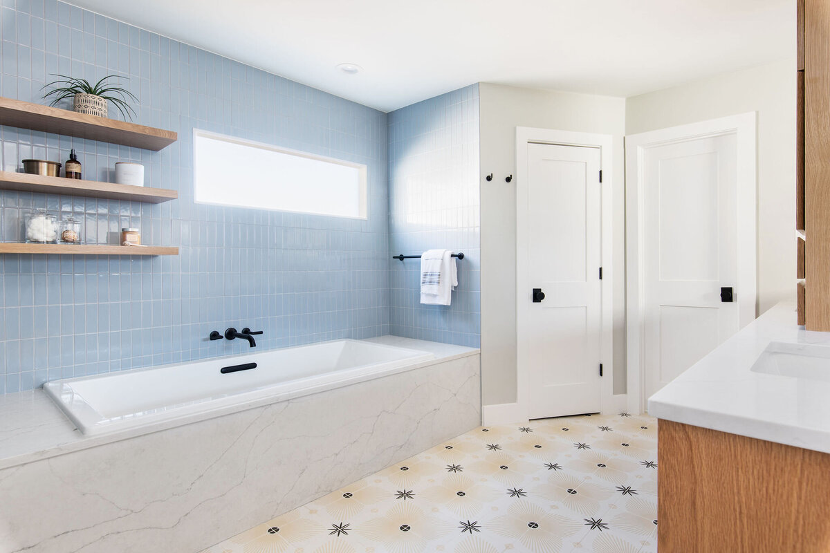 spa bathroom blue tile wood and marble 1